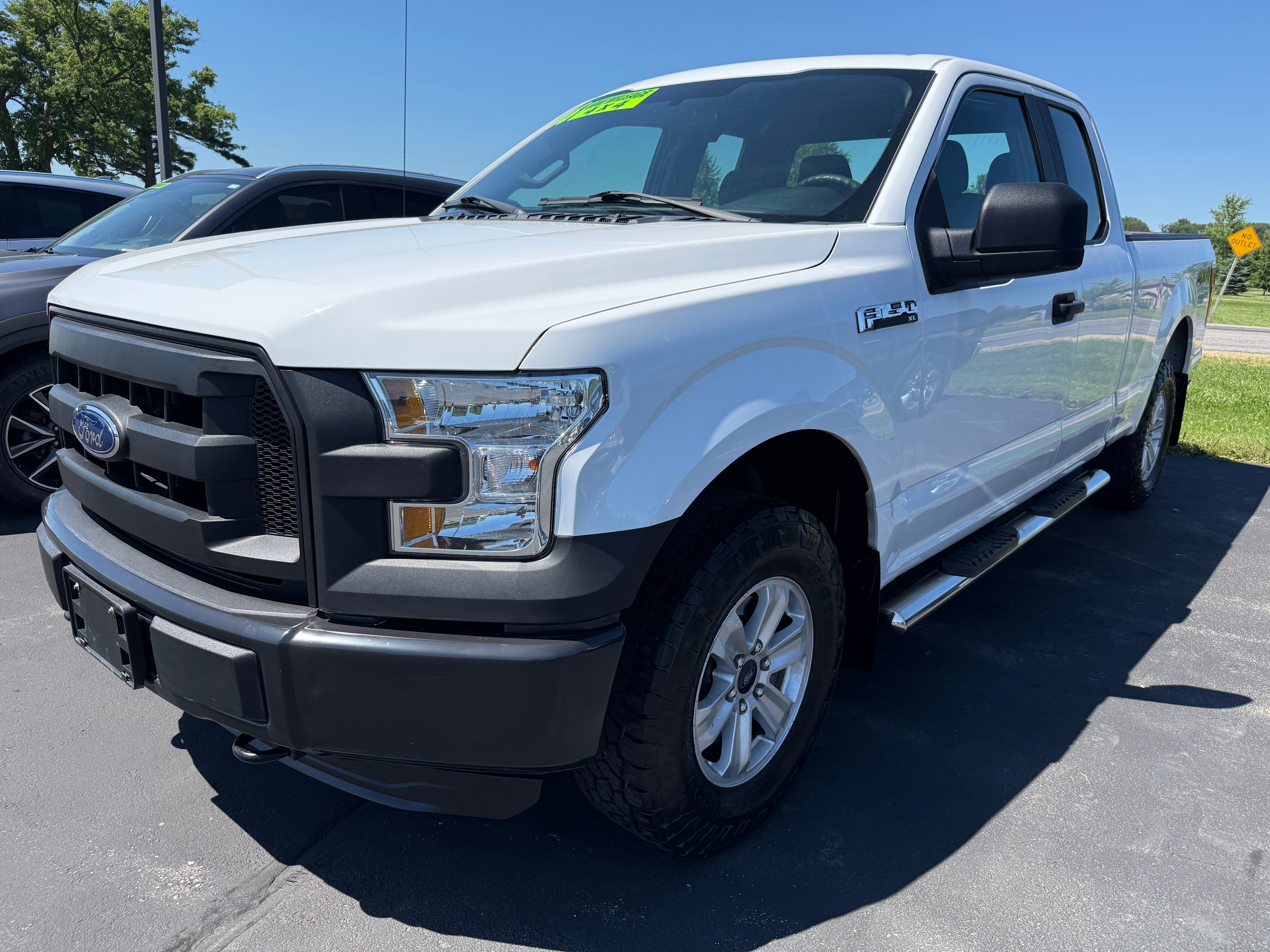2016 Ford F-150 XLT in White — front three-quarter view