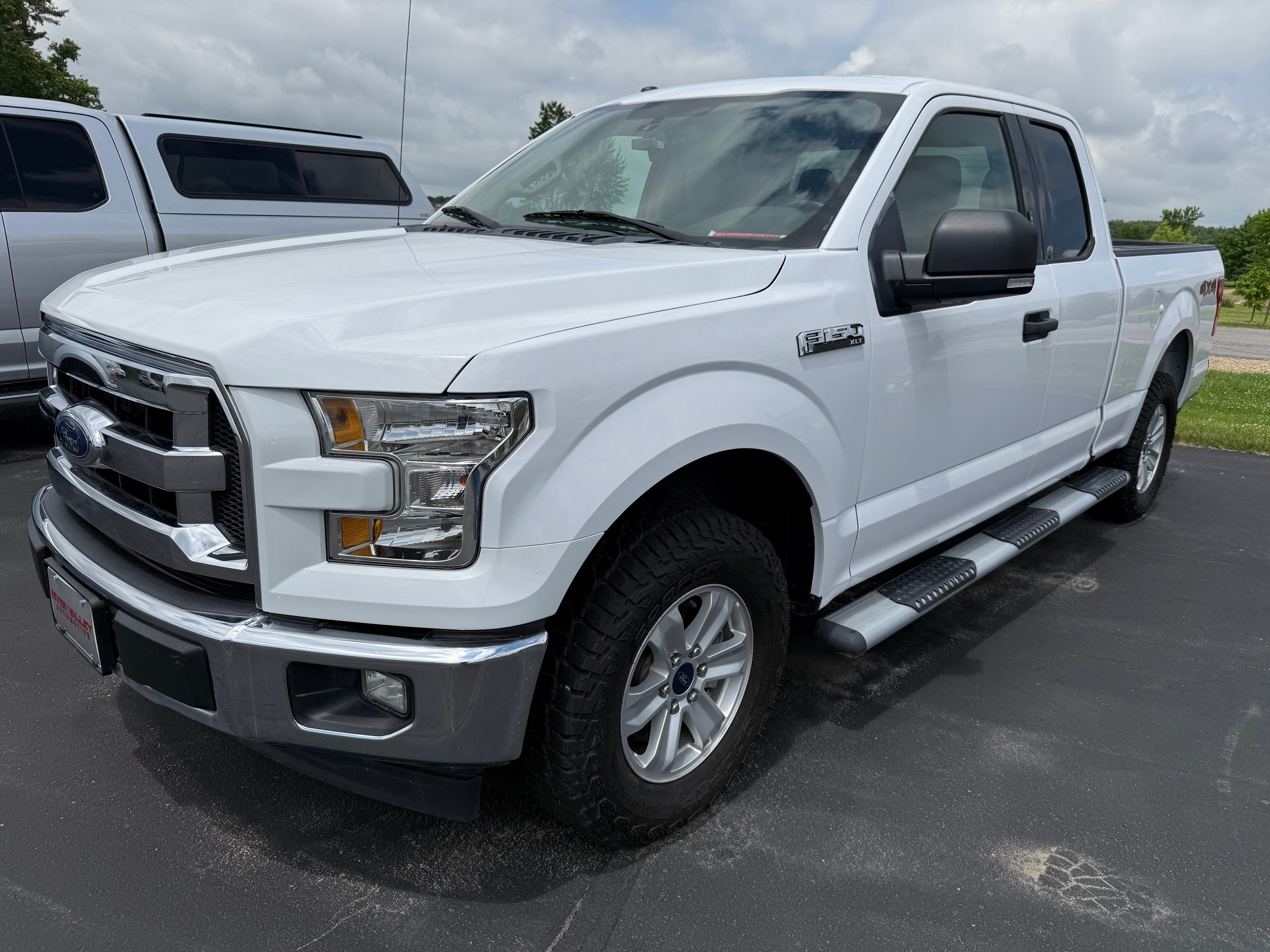 2017 Ford F-150 XLT in White — front three-quarter view