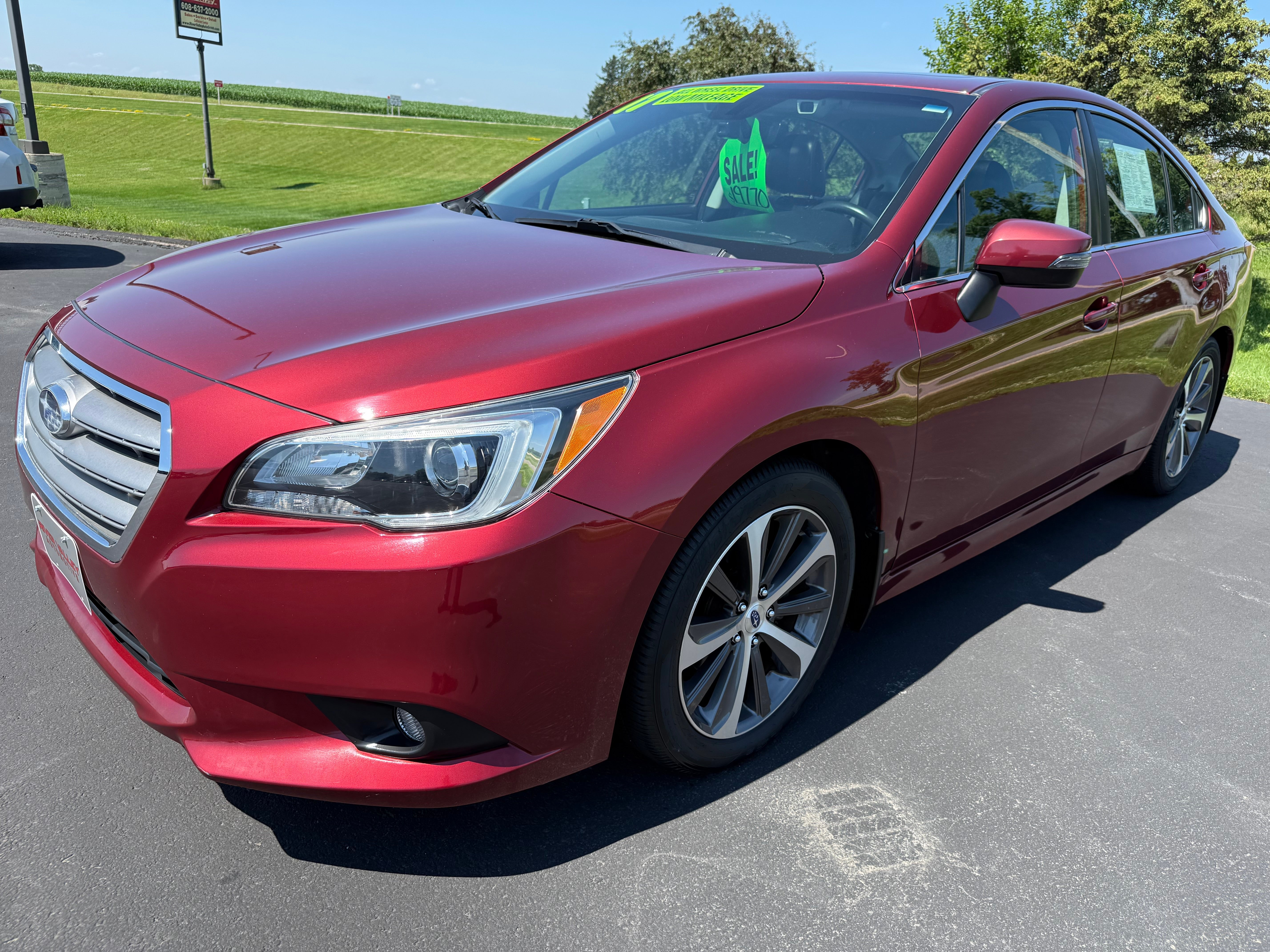 2017 Subaru Legacy Limited in Venetian Red Pearl — front three-quarter view